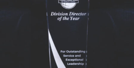 A Division Director of the Year Plaque with a black base and white color highlighting plate available for purchase on muskurado.com
